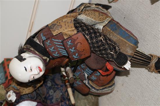 A collection of Japanese lacquered and composition head Gosha dolls, including three Musha Samurai, c.1900-1920